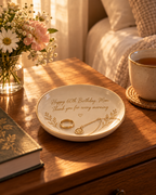 Morning Keepsake personalized ceramic trinket tray with gold message on a bedside table