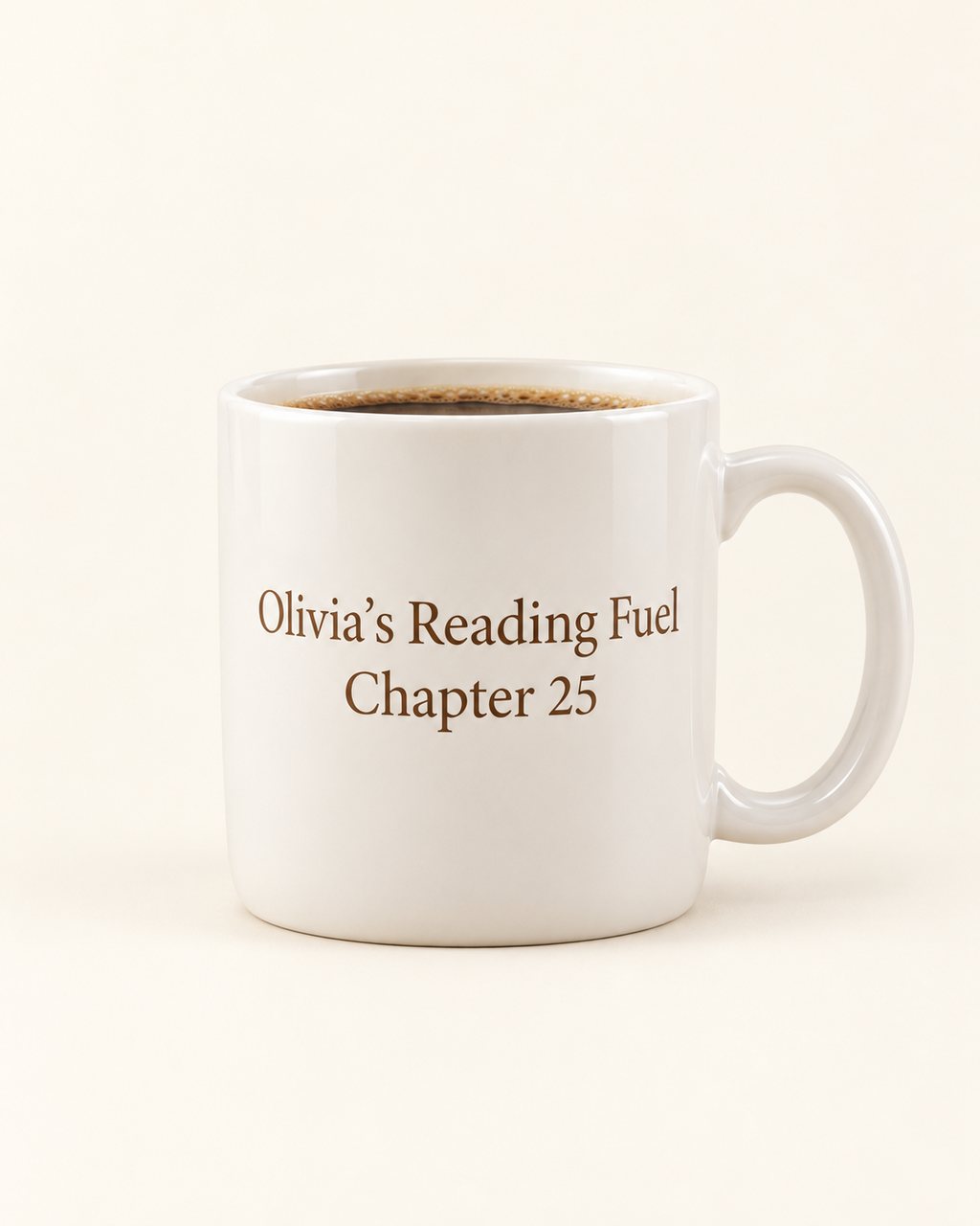 Personalized ceramic mug with custom name and message on a plain cream background