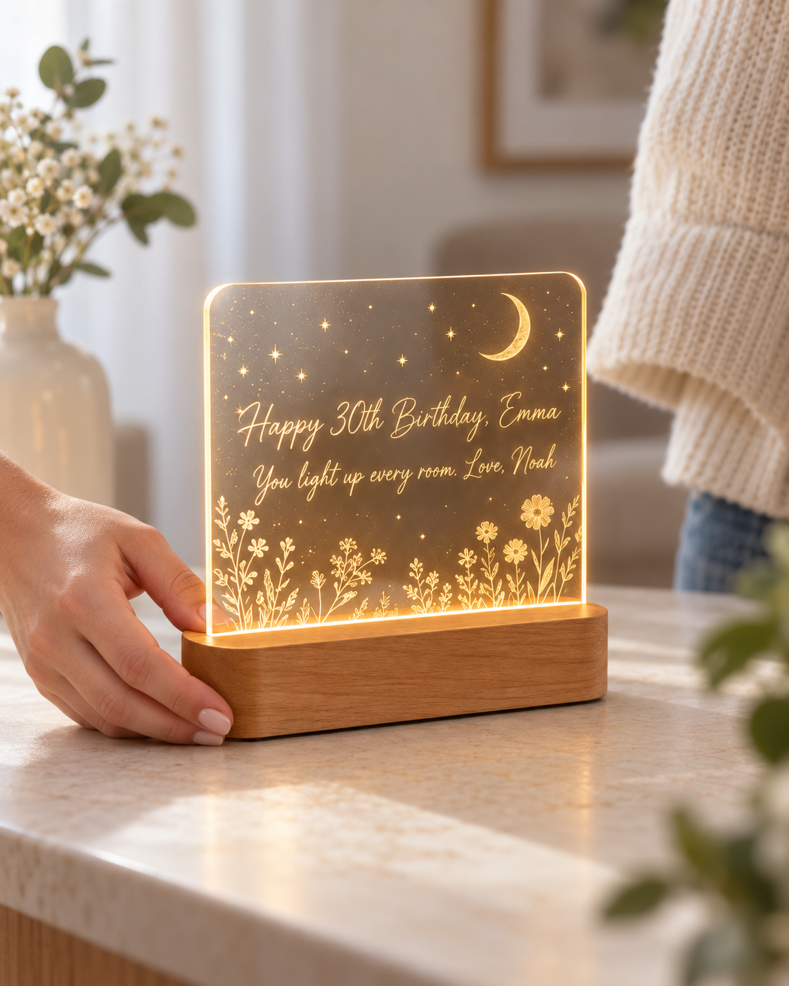 Our Glow night light held in hand to show its size